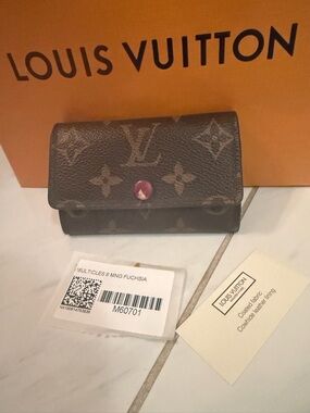 Louis Vuitton Monogram Small Wallet with Fuchsia Snap